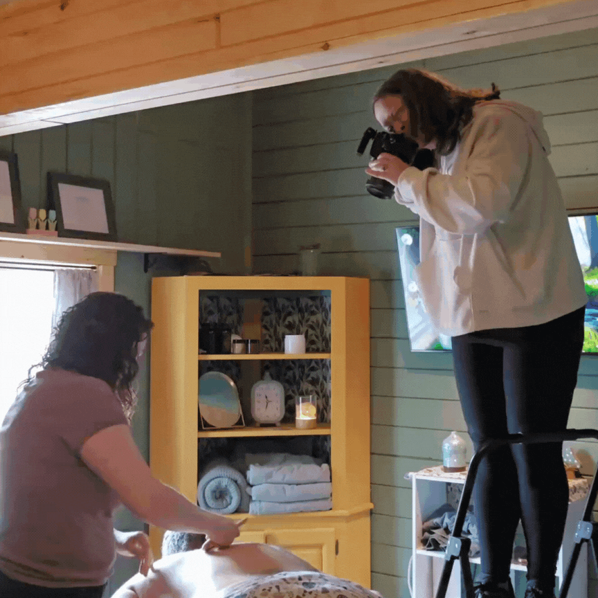photographer captures massage therapist at work
