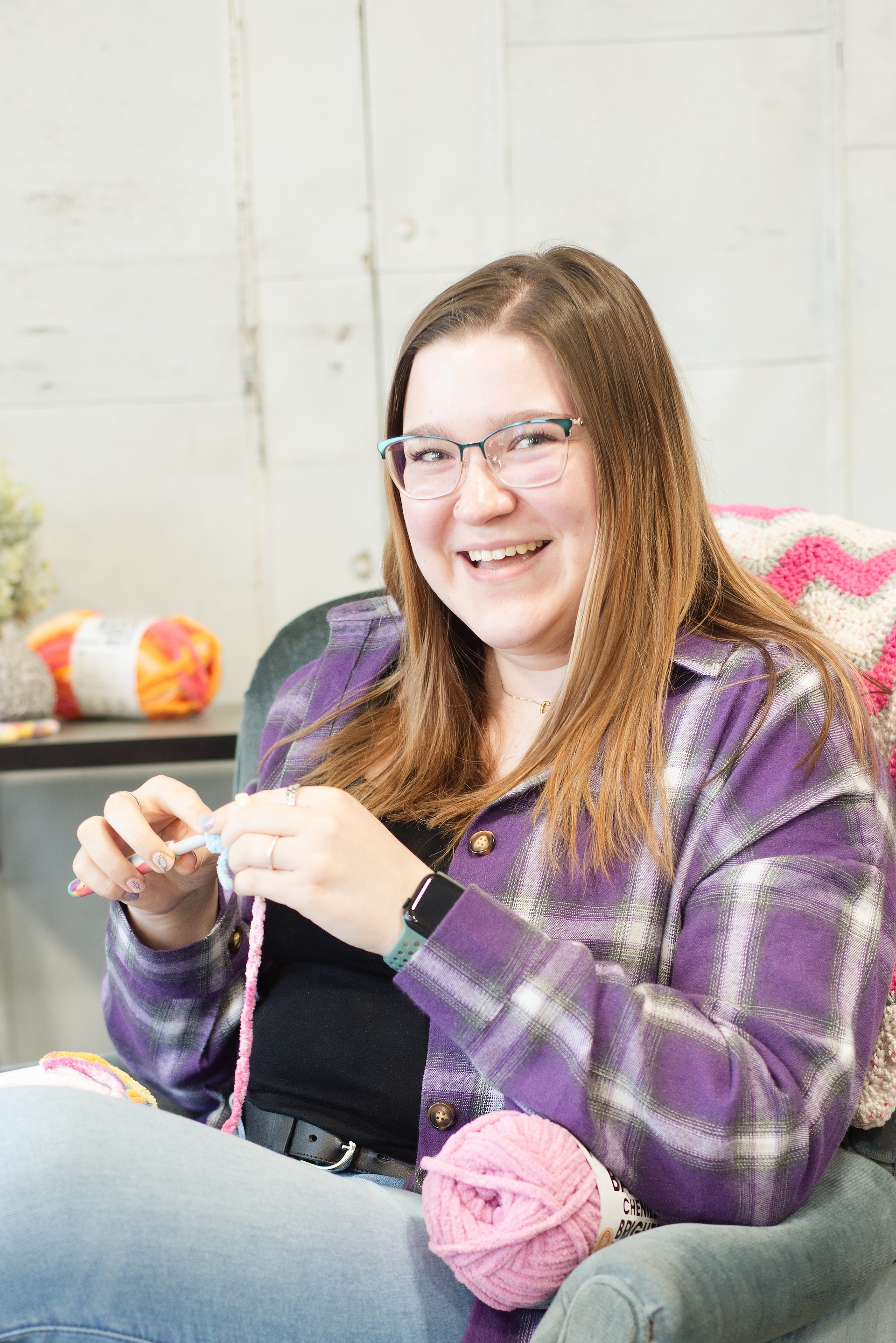 woman starts crochet project