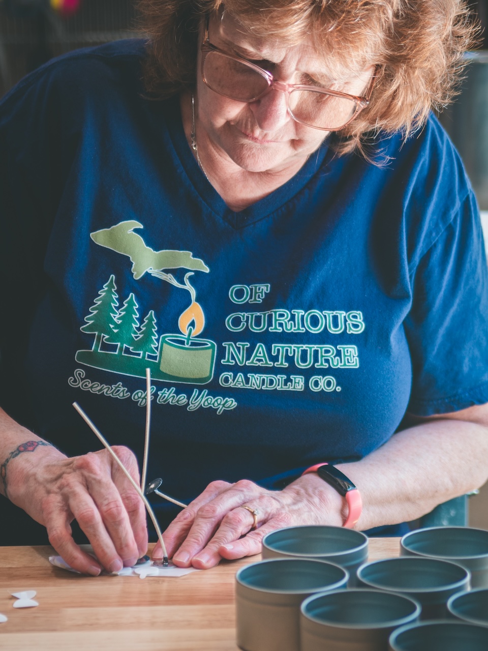 woman making a candle