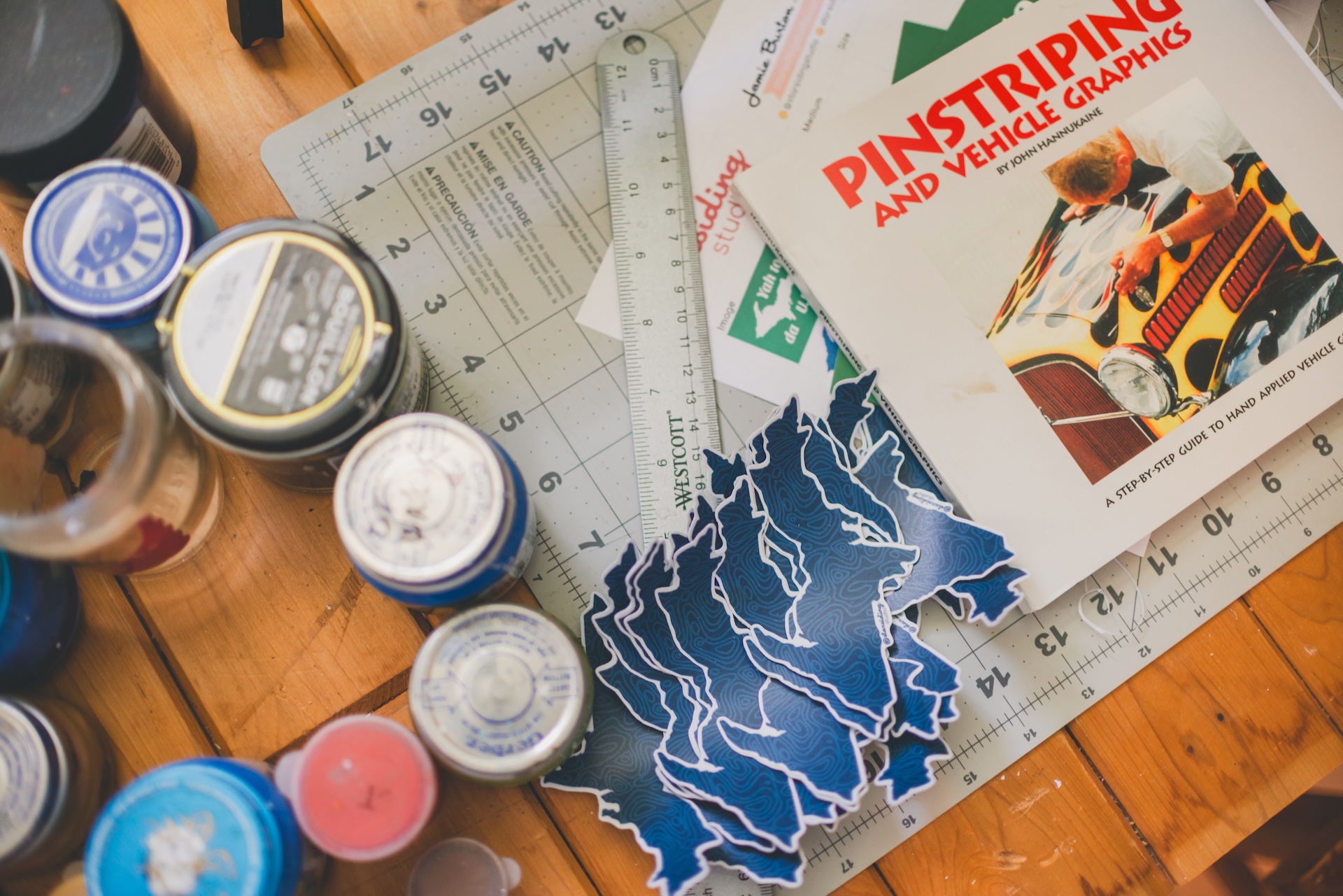 Close up of hand-painted art, tools, or details during a personal branding session