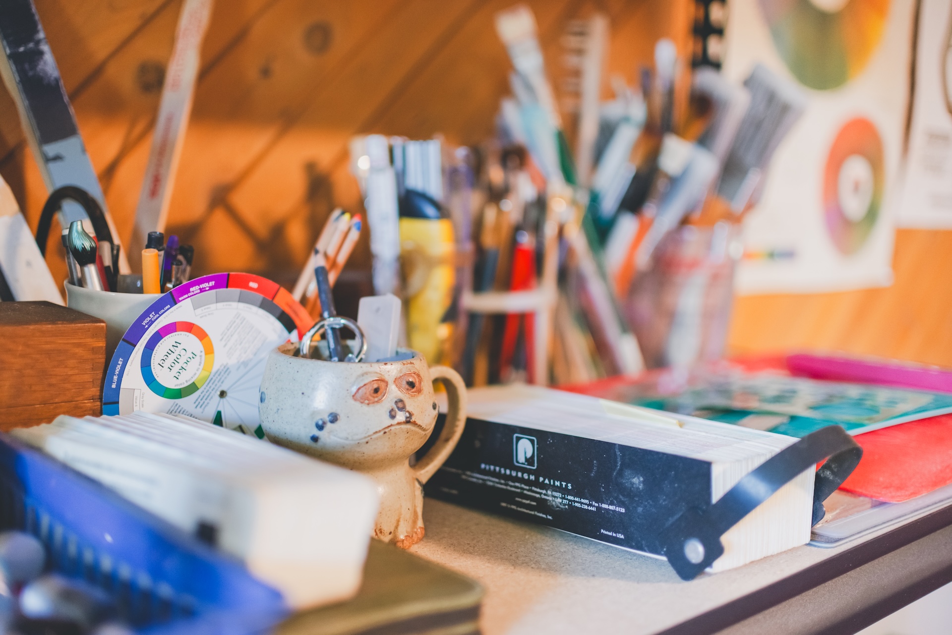 Close up of hand-painted art, tools, or details during a personal branding session